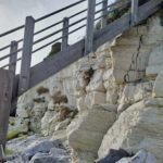 Visible cracks on the rocks below the Holywell Steps on the Eastbourne Coastline