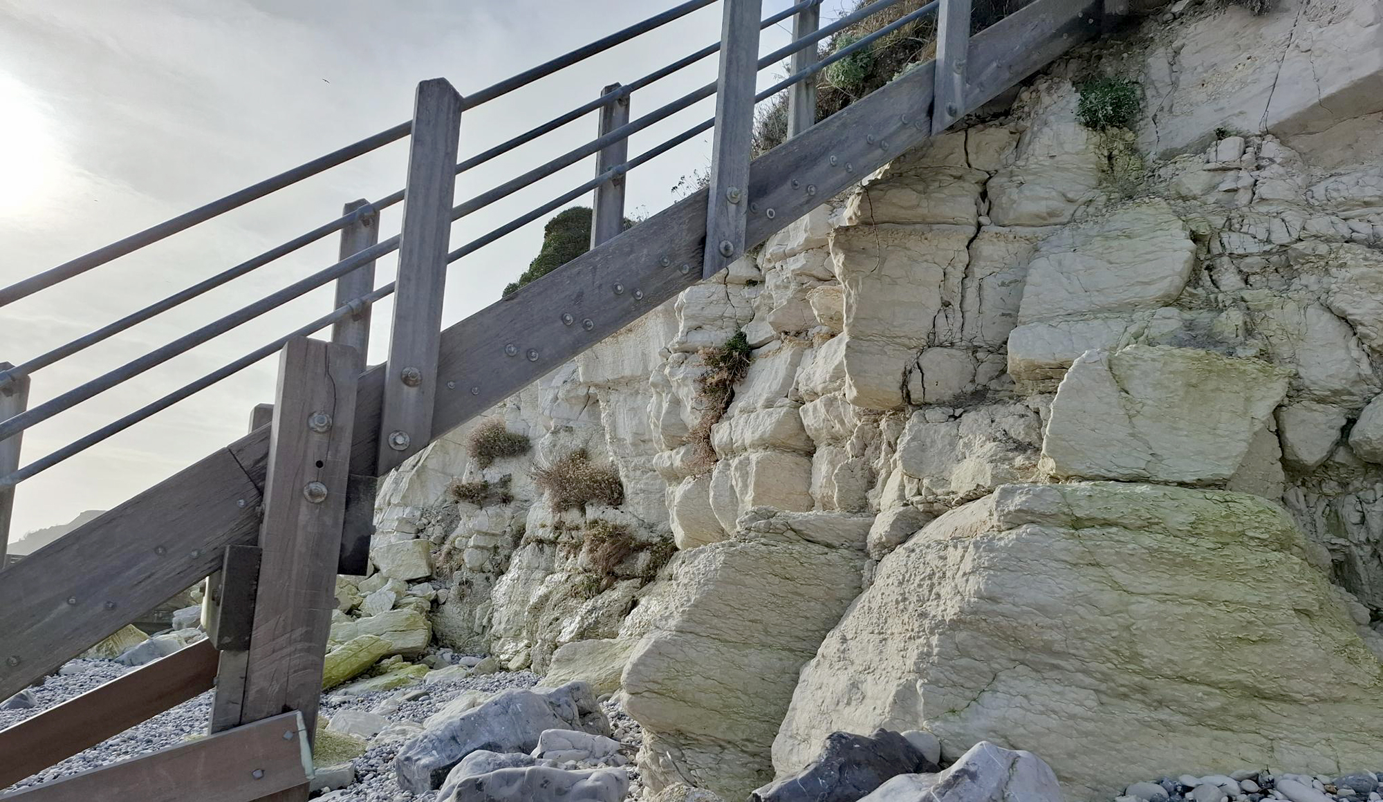 Visible cracks on the rocks below the Holywell Steps on the Eastbourne Coastline