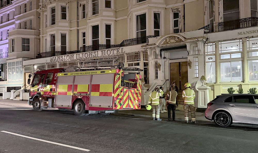 Fire Crews attend the Mansion Lions Hotel after people were spotted on the roof.