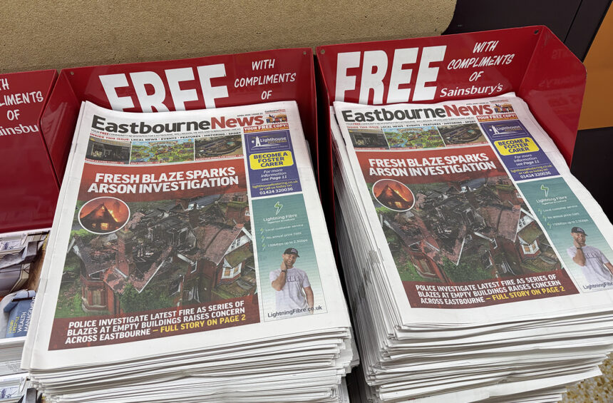 Free Newspaper in Eastburne Supermarket Pick Up Bin in Sainsbury's